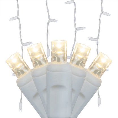 70-Light 5mm LED Icicle Lights with White/Green Cord | 6 Colors